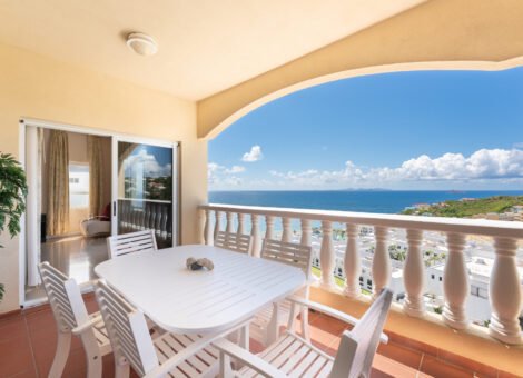 Private balcony with ocean views at Princess Heights condo overlooking St Barth’s and Caribbean Sea