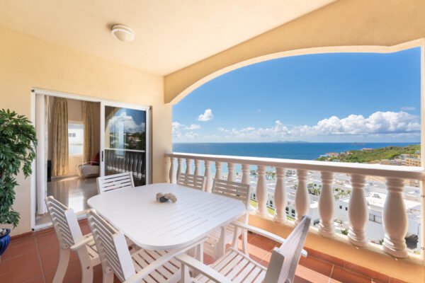 Private balcony with ocean views at Princess Heights condo overlooking St Barth’s and Caribbean Sea